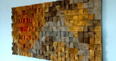 Intricate wooden wall art showcasing unique carvings and patterns.